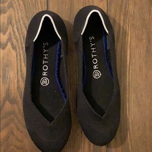 Retired Rothy’s black flats with white halo
